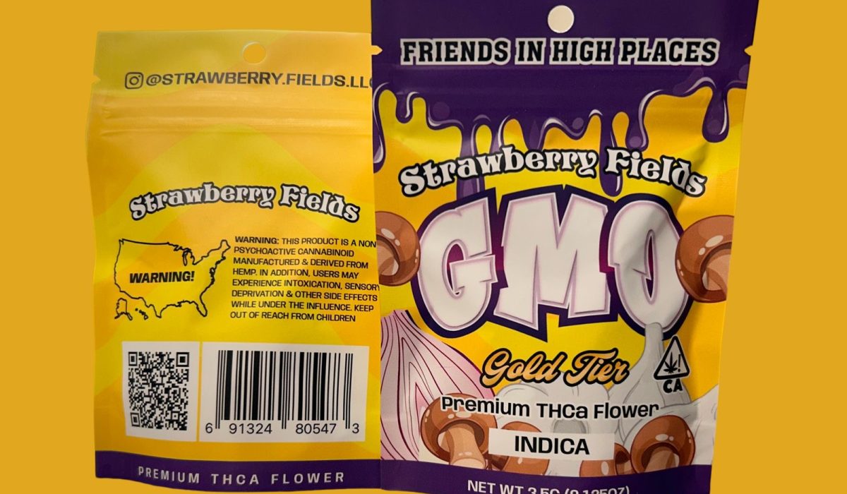 A package of Strawberry Fields GMO gold tier premium THCa flower displayed on a yellow background.
