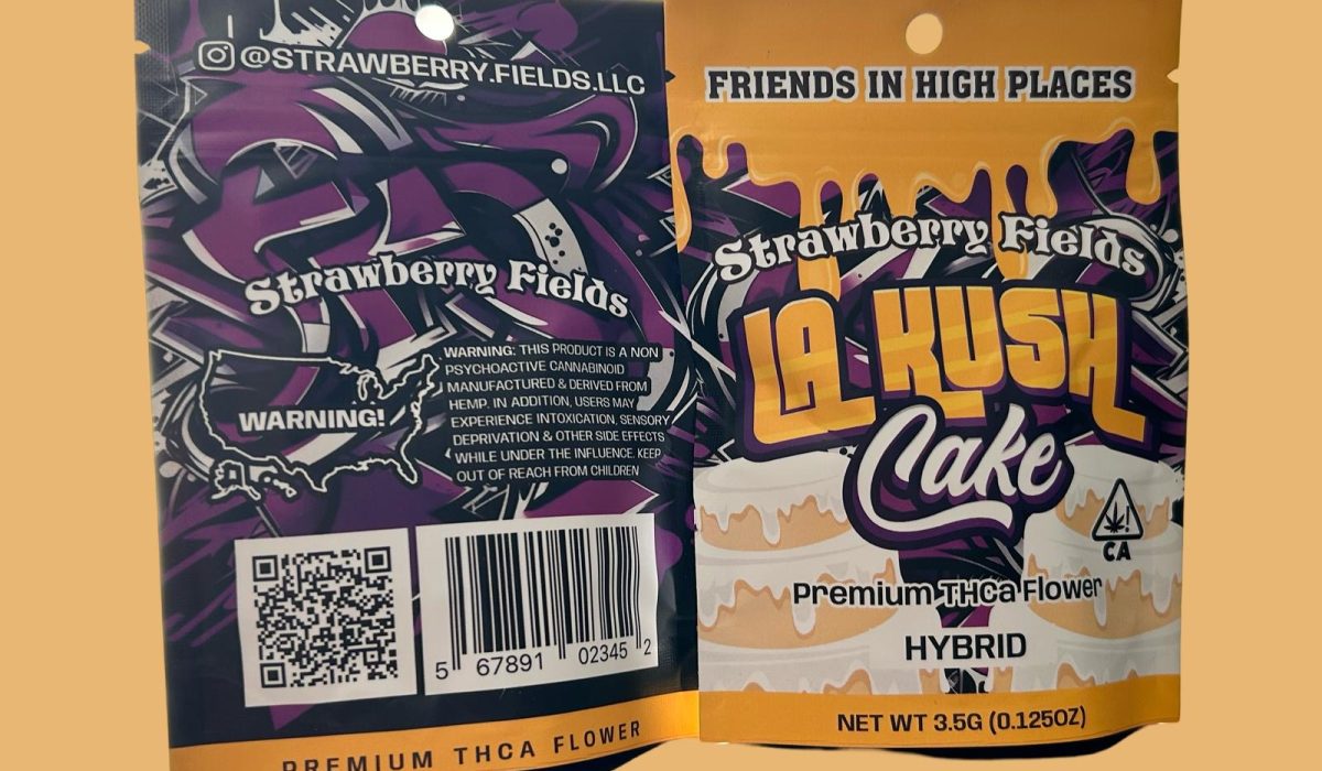 A package of Strawberry Fields LA kush cake premium THCa flower displayed on a yellow background.