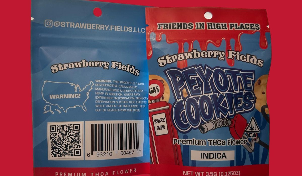 A package of Strawberry Fields peyote cookies premium THCa flower displayed on a dark red background.