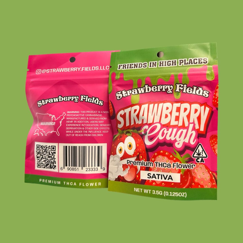 A package of Strawberry Fields strawberry cough premium THCa flower displayed on a green background.