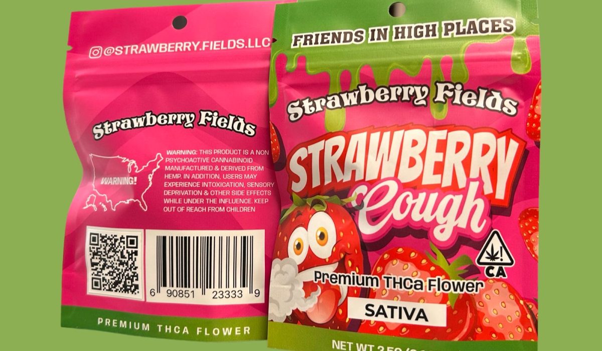 A package of Strawberry Fields strawberry cough premium THCa flower displayed on a green background.