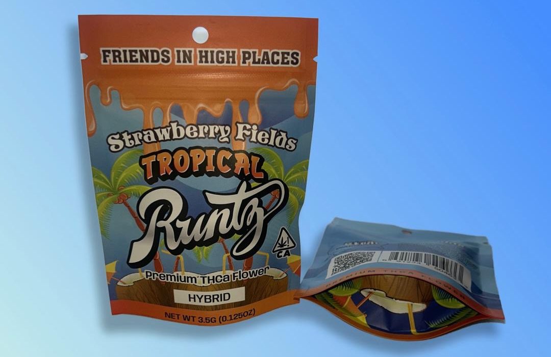 A package of Strawberry Fields tropical runtz premium THCa flower displayed on a blue background.