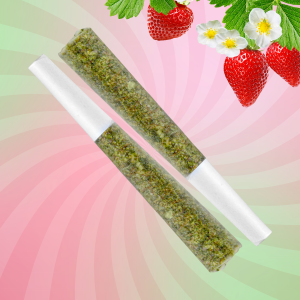 A vibrant strawberry and two cannabis prerolls displayed against a soft pink and green spiral background